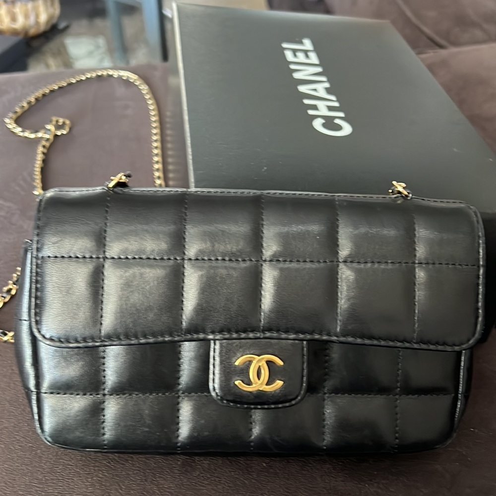 authentic CHANEL Lambskin Quilted Mini Rectangular Flap in Black